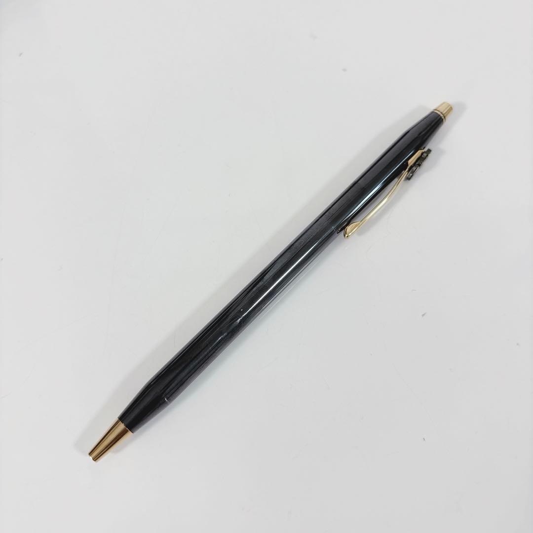 Cross Mickey ballpoint pen with black and gold design featuring Mickey Mouse figure, slight tarnish visible