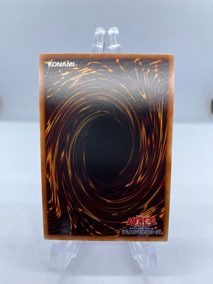 Holographic Konami Yu-Gi-Oh Illusionist Magician 20th Anniversary foil card showing ATK 2000 DEF 1700