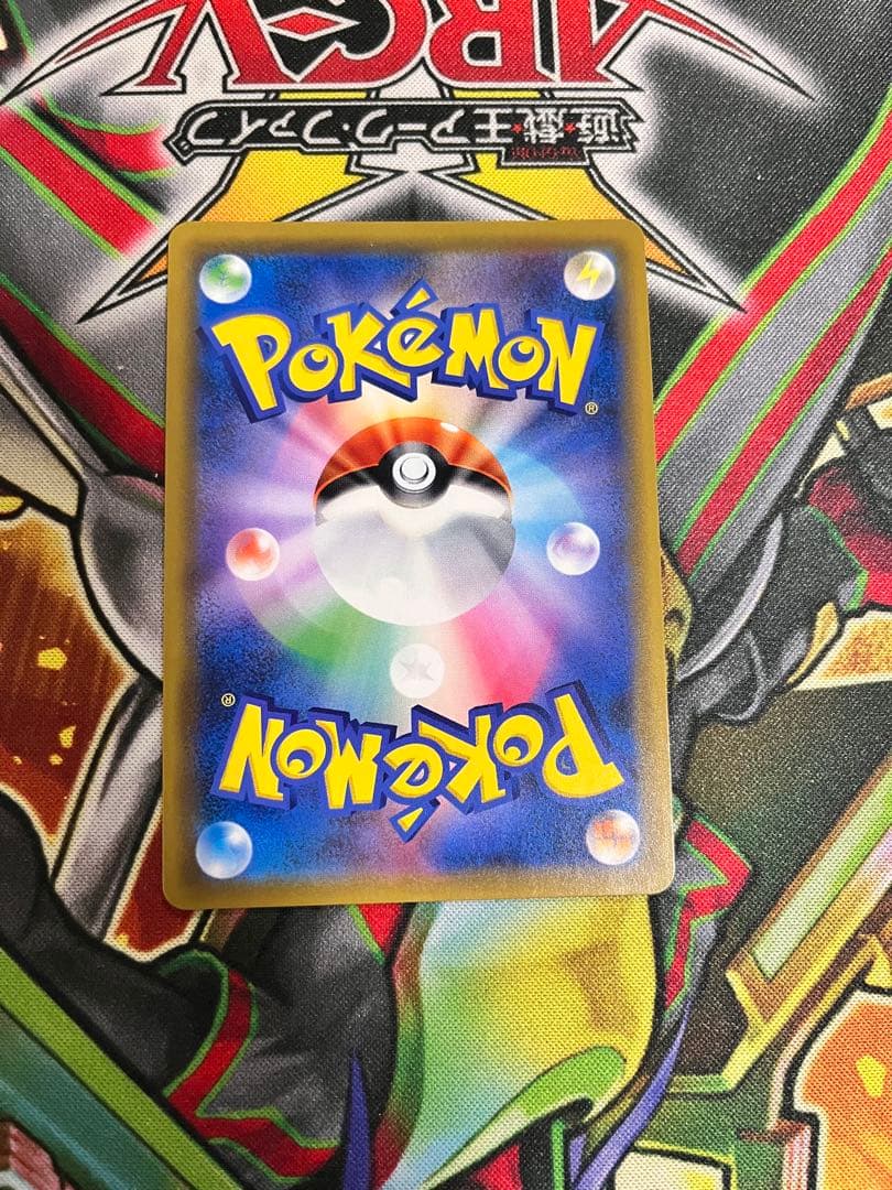 Bandai Latias & Latios GX SR SM9 104/095 Pokemon collectible card in protective sleeve