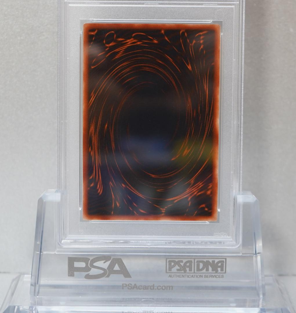 Yu-Gi-Oh PSA9 Ultra Obelisk the Tormentor trading card sealed in protective case with colored back