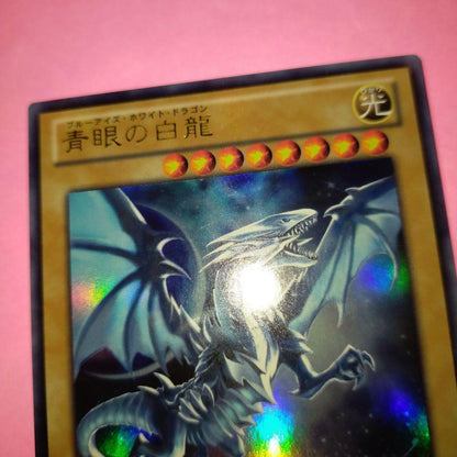 Blue-Eyes White Dragon Ultra Rare Yu-Gi-Oh card VJMP-JP080 Japan import with slight front marks and scratched back