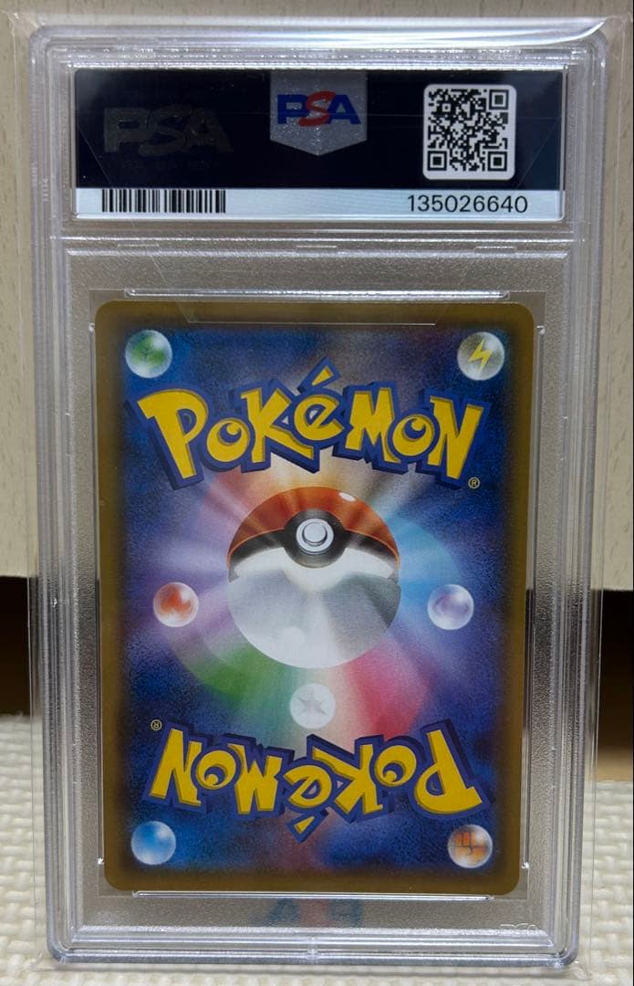 Pokemon Card Blissey & Darkrai GX RR with PSA10 grading, stored in amateur condition