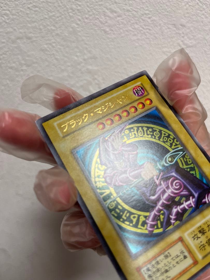 Yugioh Black Magician Early Edition Ultra Rare Japanese trading card with minor wear and scratches