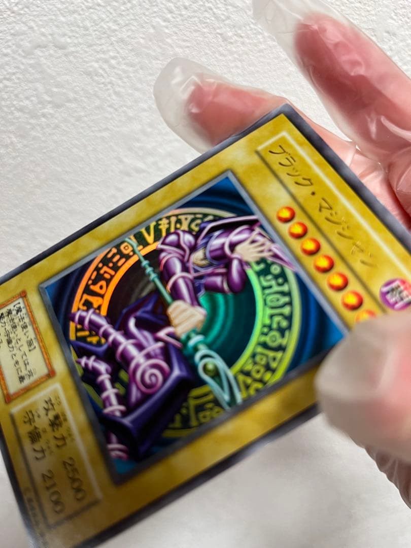 Yugioh Black Magician Early Edition Ultra Rare Japanese trading card with minor wear and scratches