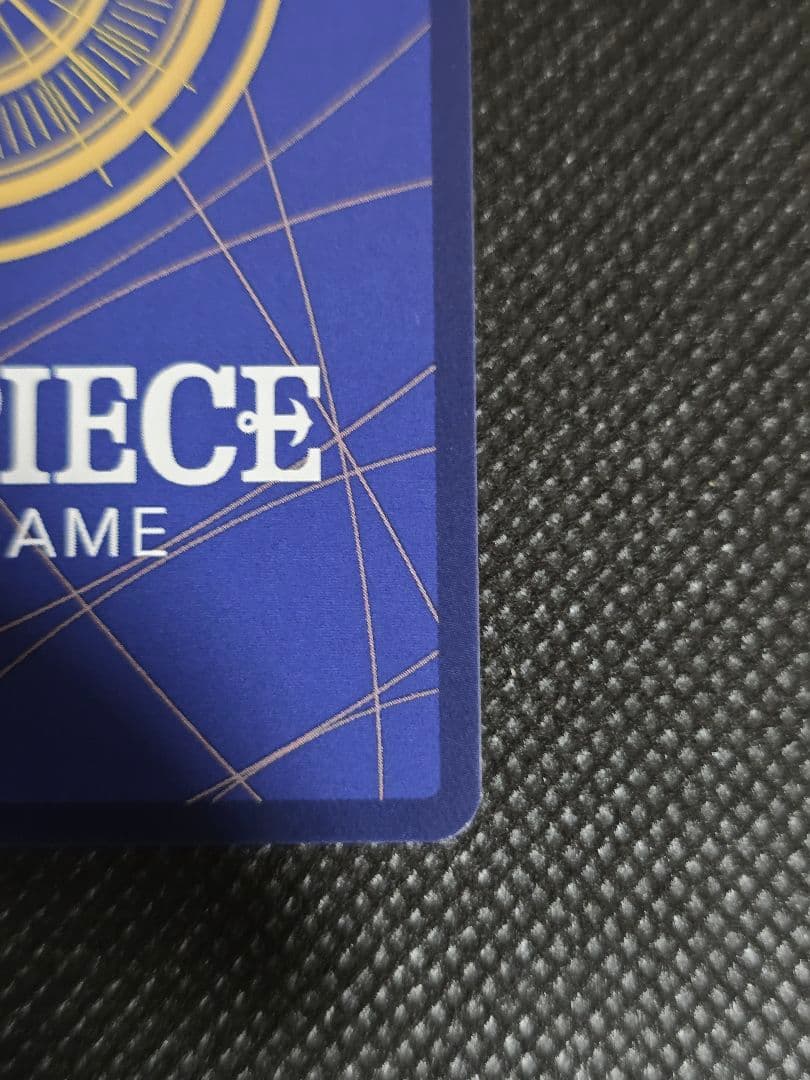 One Piece Card Game Nami R Card in sleeve showing front artwork from Japan import