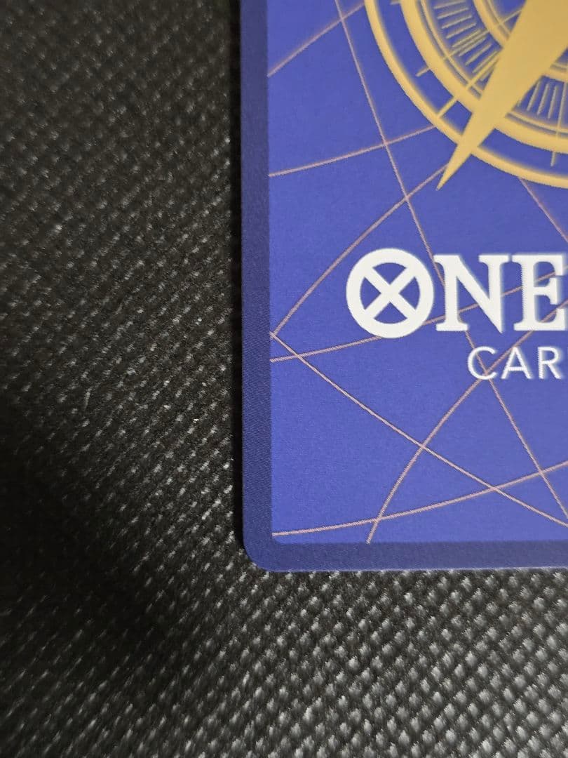 One Piece Card Game Nami R Card in sleeve showing front artwork from Japan import