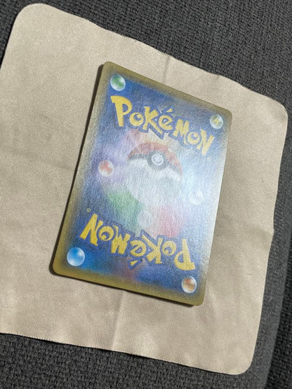 Sony Pikachu and Zekrom GX RR SM9 Japanese collectible trading card in good condition