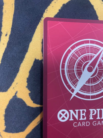 Uta One Piece Card Game Leader Parallel OP06-001 card with film elements showing slight corner defect