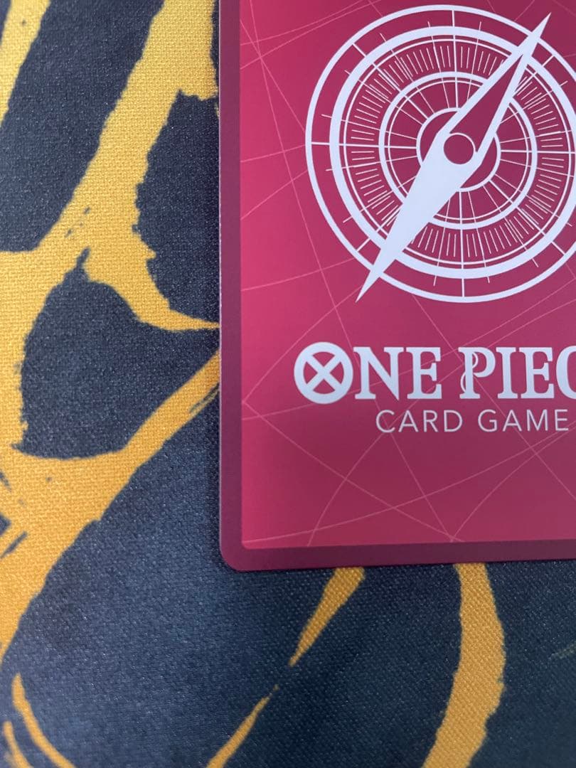 Uta One Piece Card Game Leader Parallel OP06-001 card with film elements showing slight corner defect