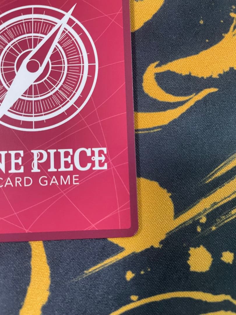 Uta One Piece Card Game Leader Parallel OP06-001 card with film elements showing slight corner defect