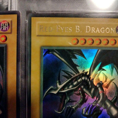 Yu-Gi-Oh! Red-Eyes Black Dragon SDJ-001 Ultra Rare English trading card with yellowed surface