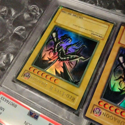 Yu-Gi-Oh! Red-Eyes Black Dragon SDJ-001 Ultra Rare English trading card with yellowed surface