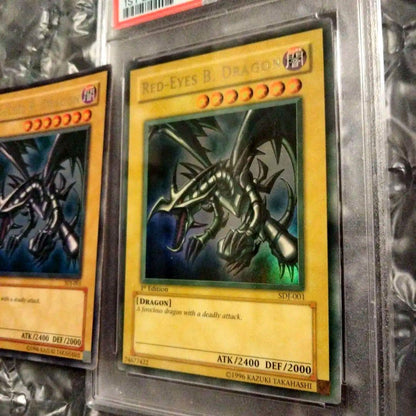 Yu-Gi-Oh! Red-Eyes Black Dragon SDJ-001 Ultra Rare English trading card with yellowed surface