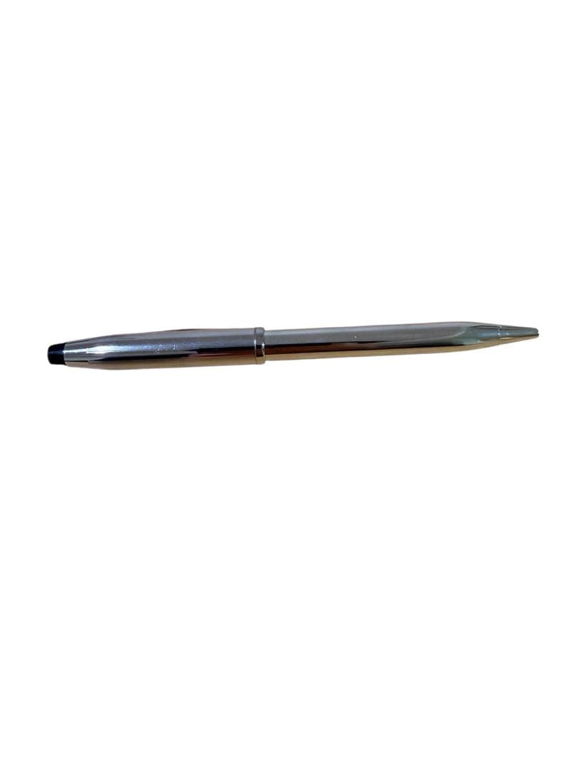 Silver Cross ballpoint pen with clip and red ink refill in a sleek portable design