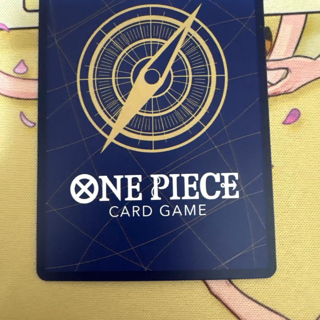Nami Premium Card Collection Parallel OP02-036 one piece card with dent at upper left corner on back