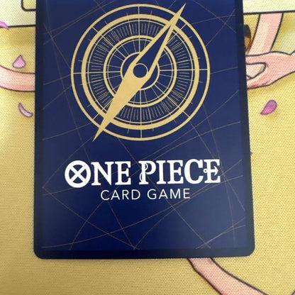 Nami Premium Card Collection Parallel OP02-036 one piece card with dent at upper left corner on back