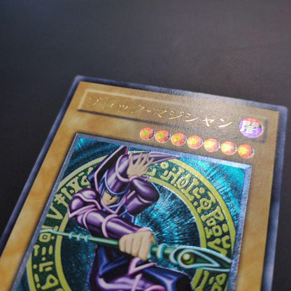 Black Magician The Dark Magician Level 7 Ultimate Rare monster card with dark attribute and 2500 attack points