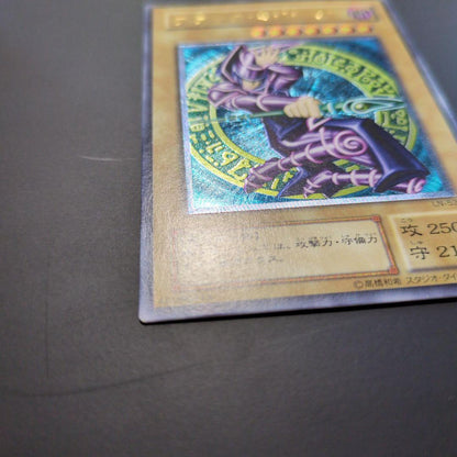Black Magician The Dark Magician Level 7 Ultimate Rare monster card with dark attribute and 2500 attack points