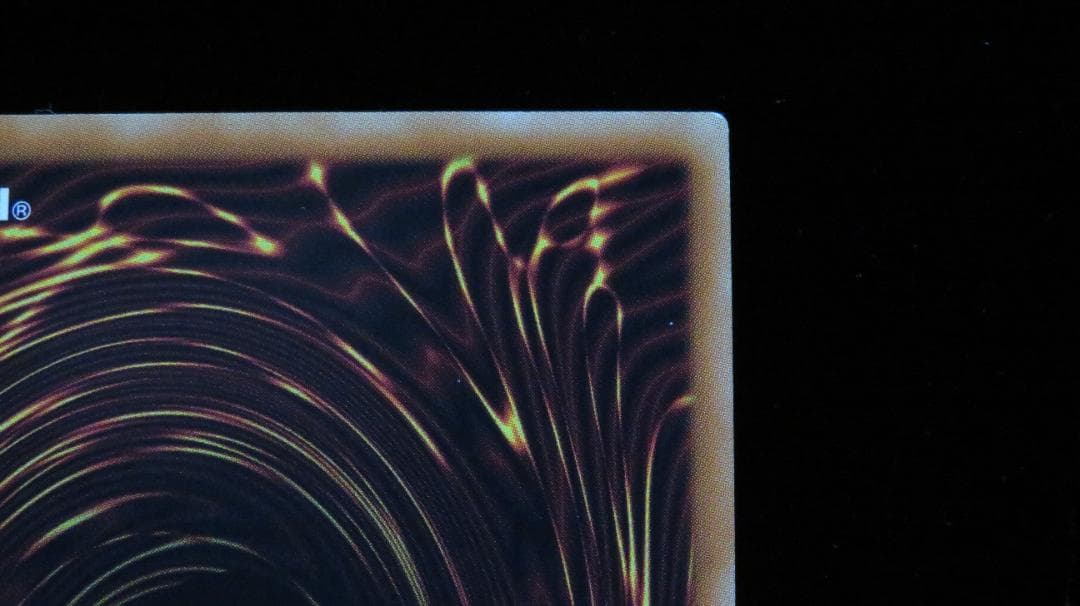 Yu-Gi-Oh Bandai Sacrifices holographic rare card DP19-JP000 with visible scratches and wear