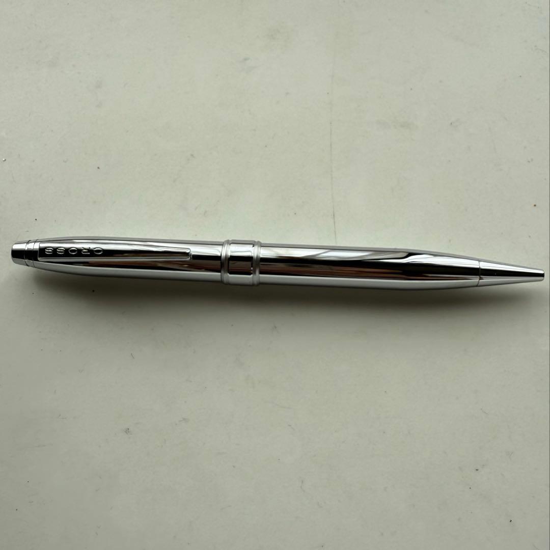Cross metallic chrome plated ballpoint pen with twist mechanism and metal body