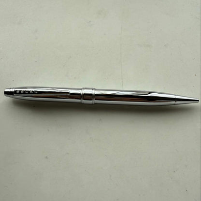Cross metallic chrome plated ballpoint pen with twist mechanism and metal body