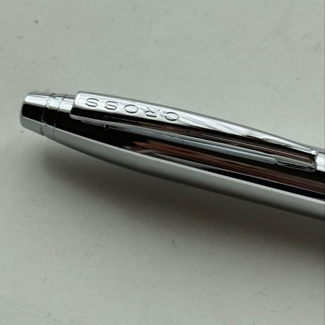 Cross metallic chrome plated ballpoint pen with twist mechanism and metal body