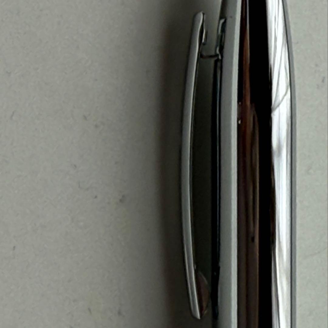 Cross metallic chrome plated ballpoint pen with twist mechanism and metal body