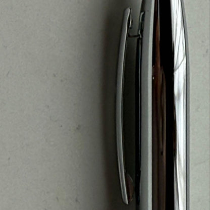 Cross metallic chrome plated ballpoint pen with twist mechanism and metal body