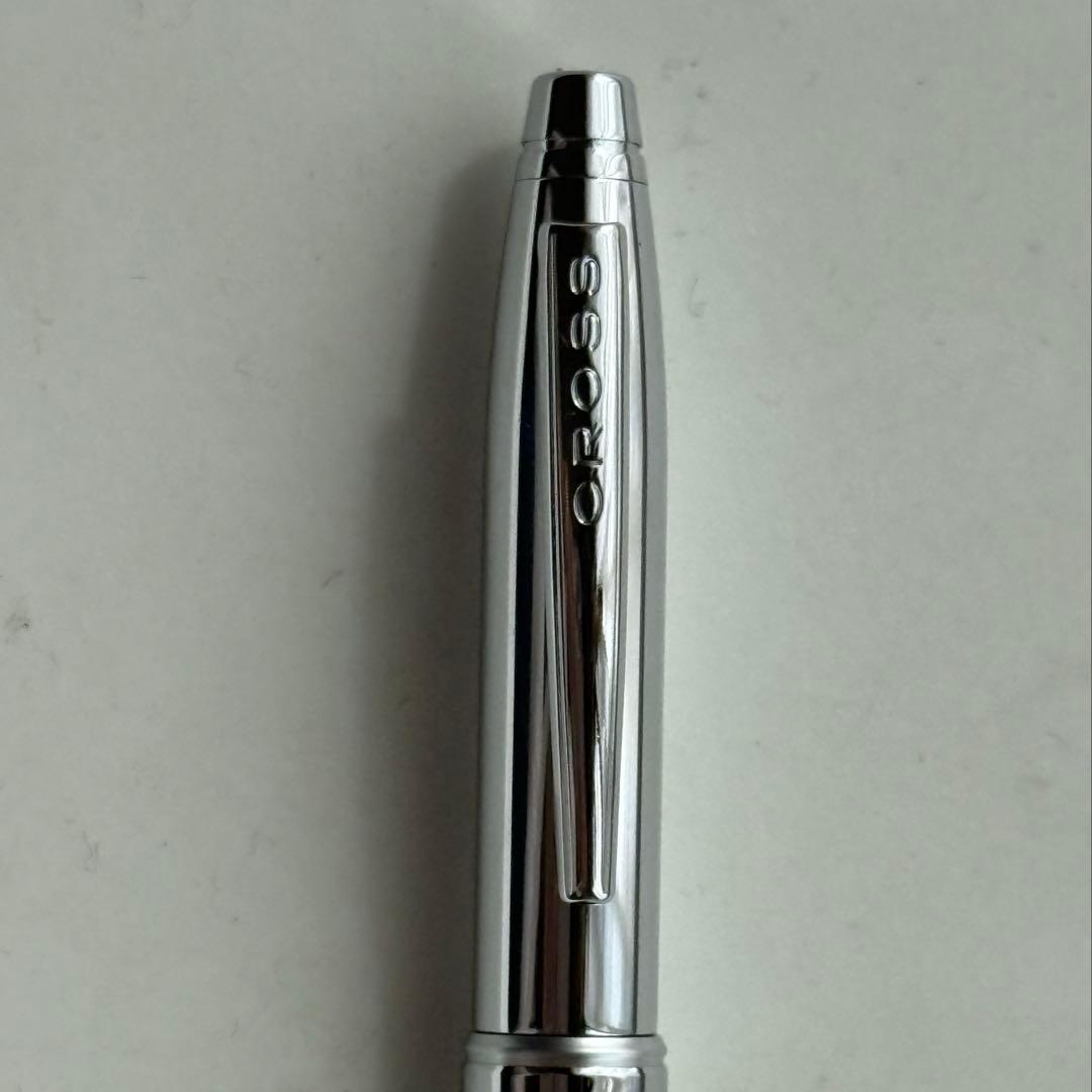 Cross metallic chrome plated ballpoint pen with twist mechanism and metal body