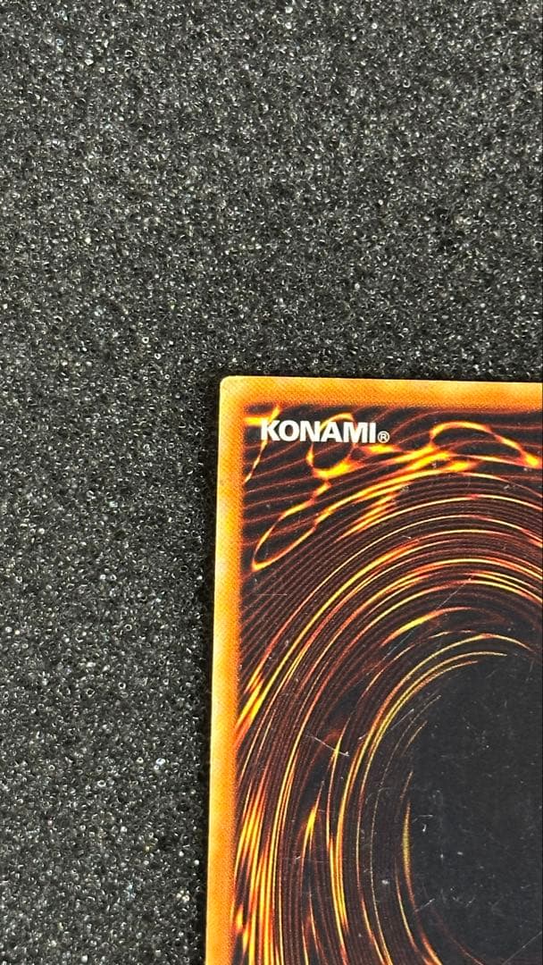 Bandai Holy Night Dragon Secret Rare Yu-Gi-Oh! card with battle-worn condition, Japanese edition