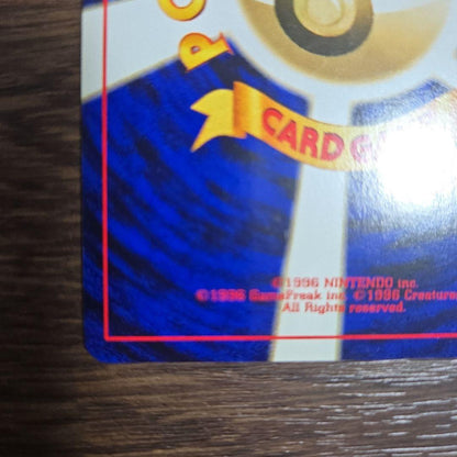 Vintage Pokemon Card Charizard LV.78 Fire Rage No.006 in old sleeve with slight wear and minor scratches
