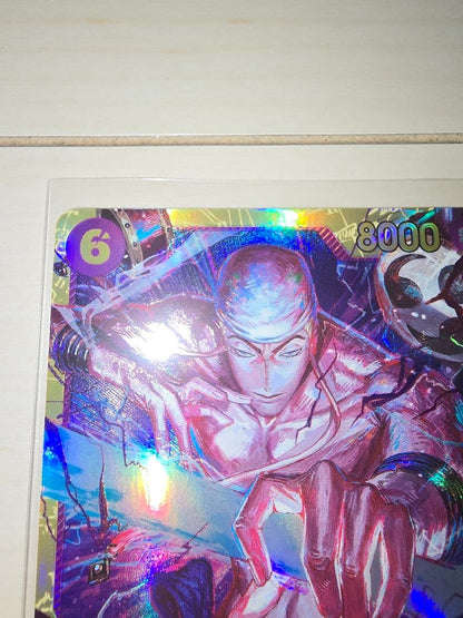 One Piece Energy Card Secret Rare in protective hard sleeve with minor signs of use