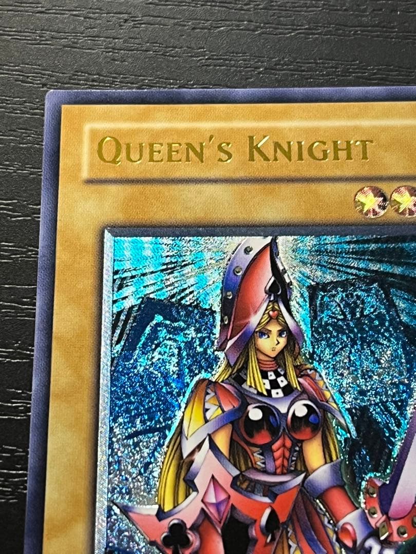 Yugioh Old Asia Edition Queen's Knight 1st Relief card showing minor scratches and wear