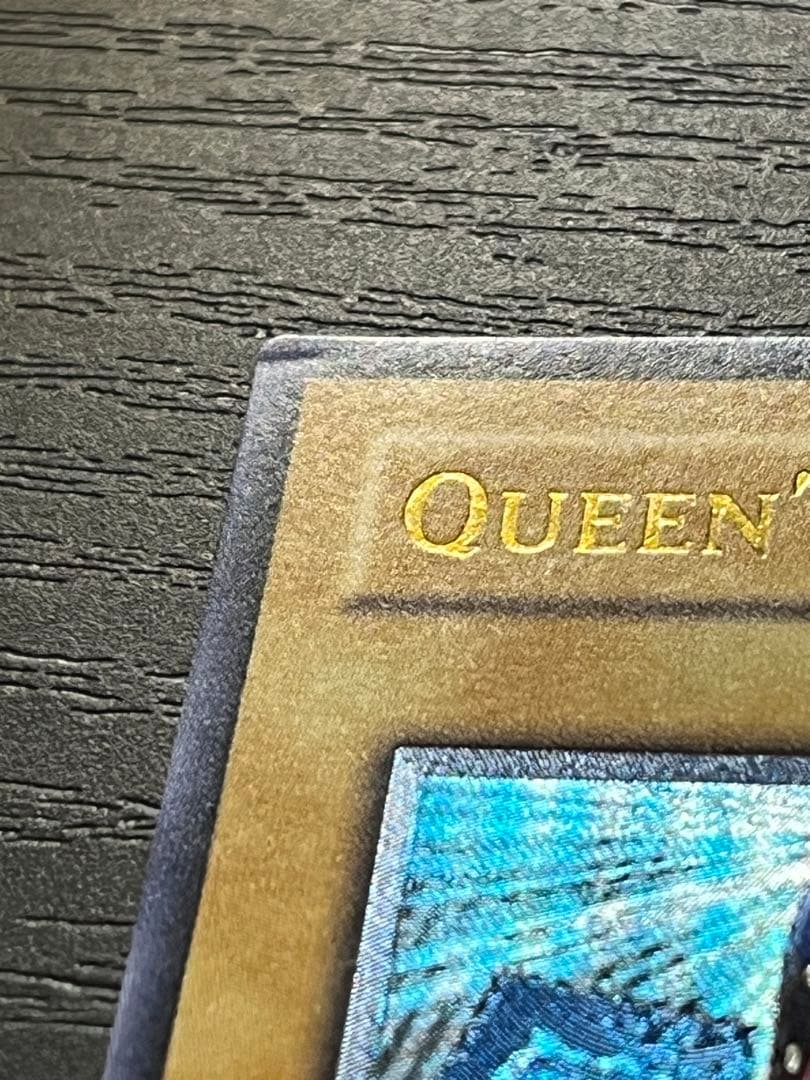 Yugioh Old Asia Edition Queen's Knight 1st Relief card showing minor scratches and wear