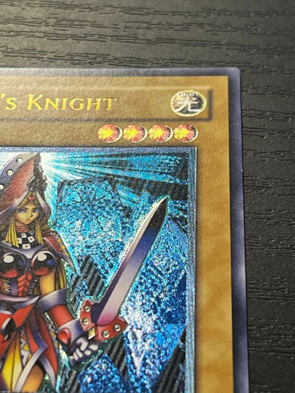 Yugioh Old Asia Edition Queen's Knight 1st Relief card showing minor scratches and wear