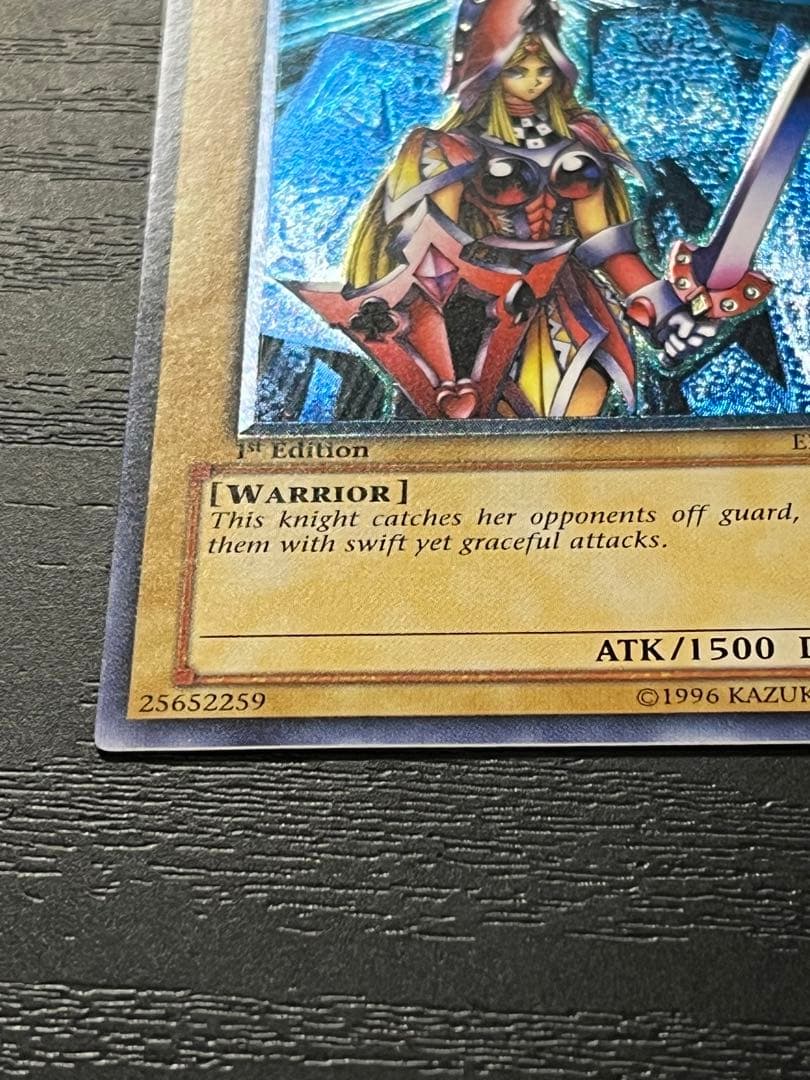 Yugioh Old Asia Edition Queen's Knight 1st Relief card showing minor scratches and wear