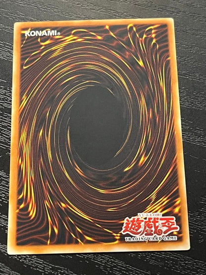 Yugioh Old Asia Edition Queen's Knight 1st Relief card showing minor scratches and wear