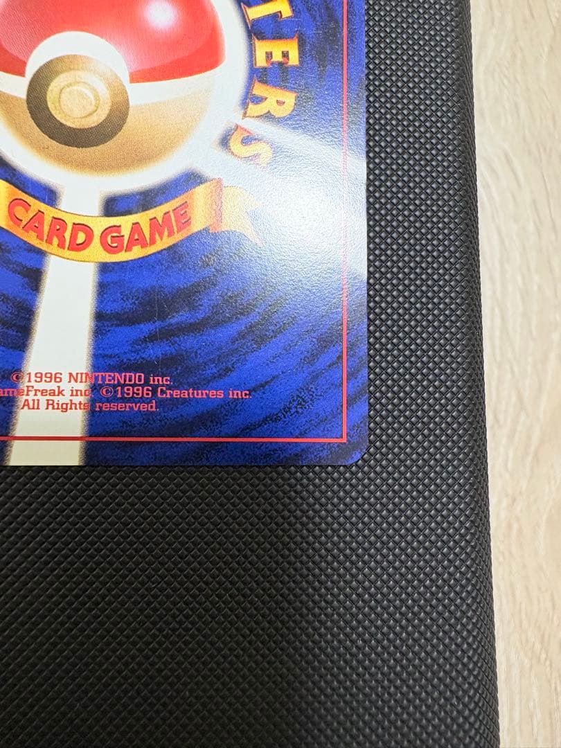 Natsume Gengar Pokémon card approximately 20 years old with protective sleeve, slight surface scratches