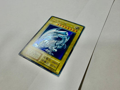 Yu-Gi-Oh Blue-Eyes White Dragon early version card Japanese language with minor wear