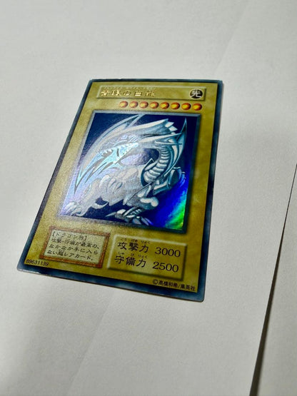 Yu-Gi-Oh Blue-Eyes White Dragon early version card Japanese language with minor wear