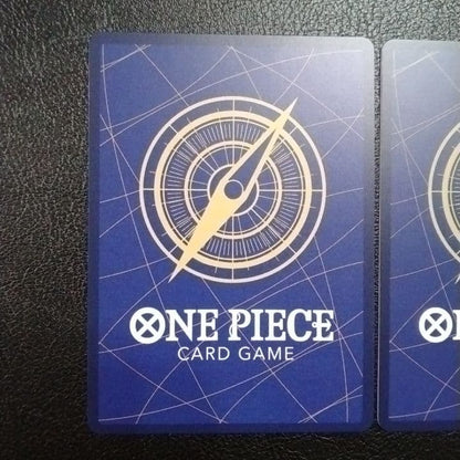 One Piece Monkey D. Luffy and Trafalgar Law SR parallel cards in protective sleeves