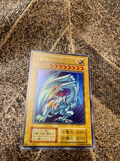 Yugioh Blue-Eyes White Dragon First Edition trading card Japan import with minor scratches