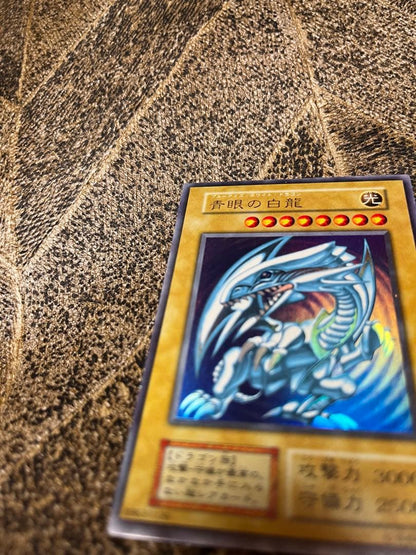 Yugioh Blue-Eyes White Dragon First Edition trading card Japan import with minor scratches