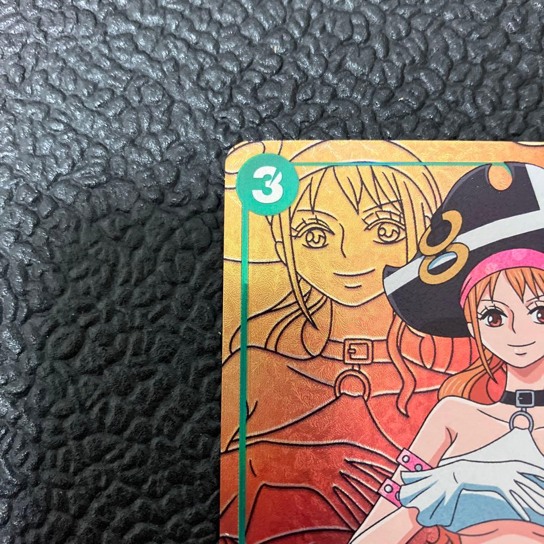 One Piece Nami SR Parallel card OP02-036 showing front design with visible wear and corner chip