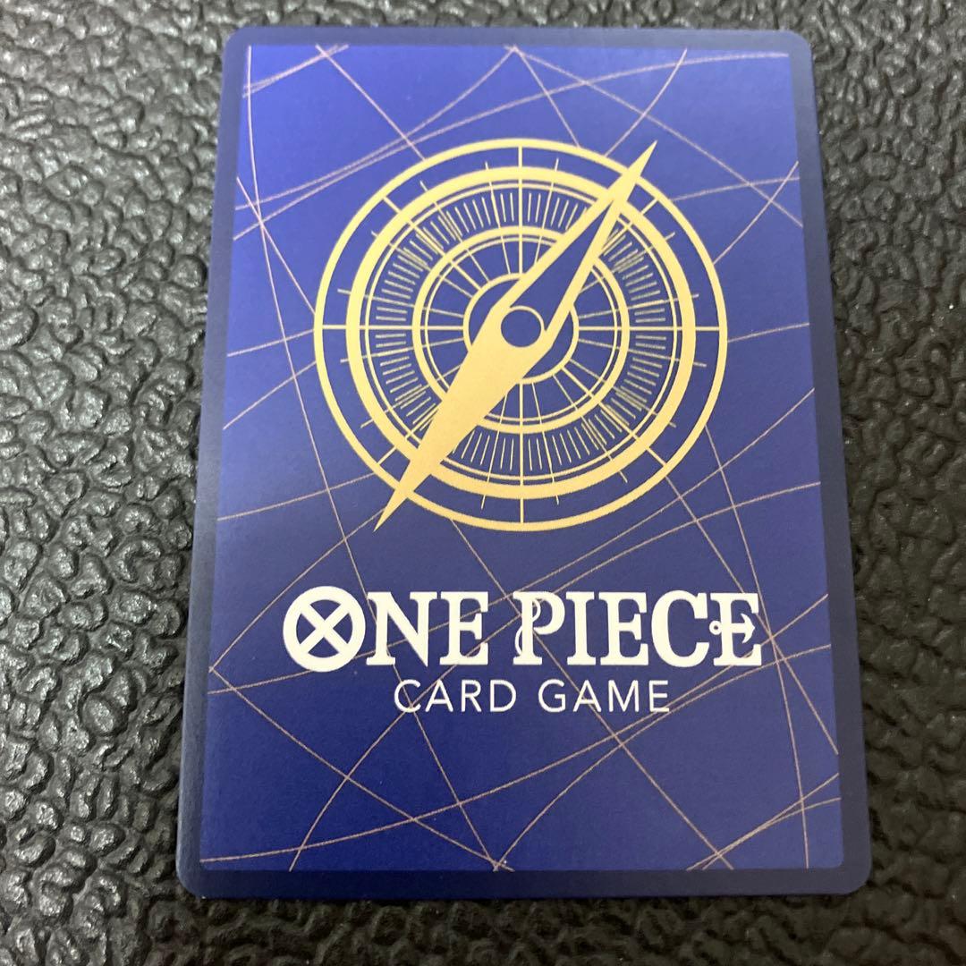 One Piece Nami SR Parallel card OP02-036 showing front design with visible wear and corner chip