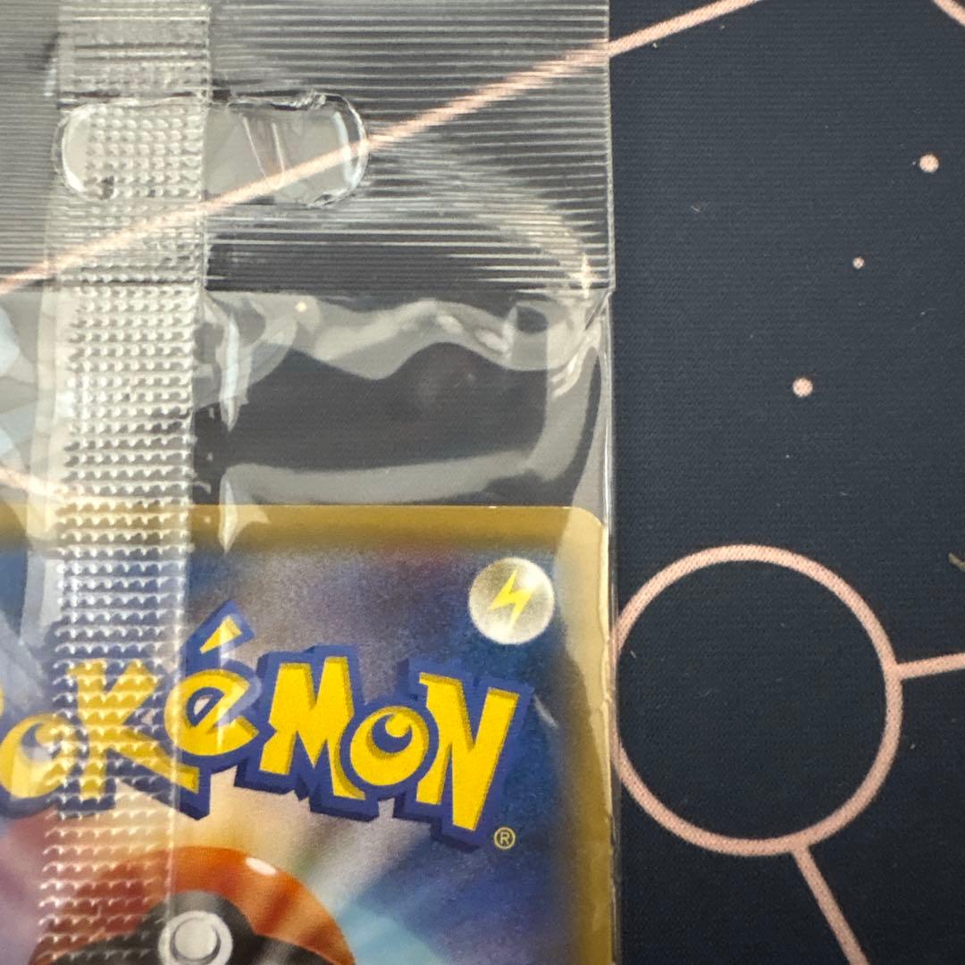 Unopened Bandai Pokémon Card Boss Play showing Pikachu and Team Rocket with model number 195/SM-P