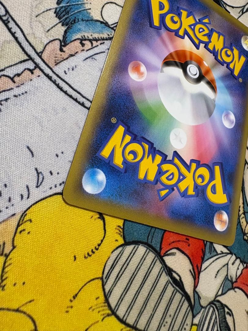 Bandai Detective Pikachu promo card 099/S-P from Sword & Shield series in water-resistant sleeve