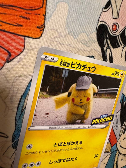 Bandai Detective Pikachu promo card 099/S-P from Sword & Shield series in water-resistant sleeve