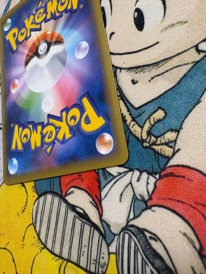 Bandai Detective Pikachu promo card 099/S-P from Sword & Shield series in water-resistant sleeve