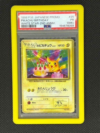 Yutaro Pikachu Old Back PSA1 Japanese collectible card with yellow cover showing signs of use and age